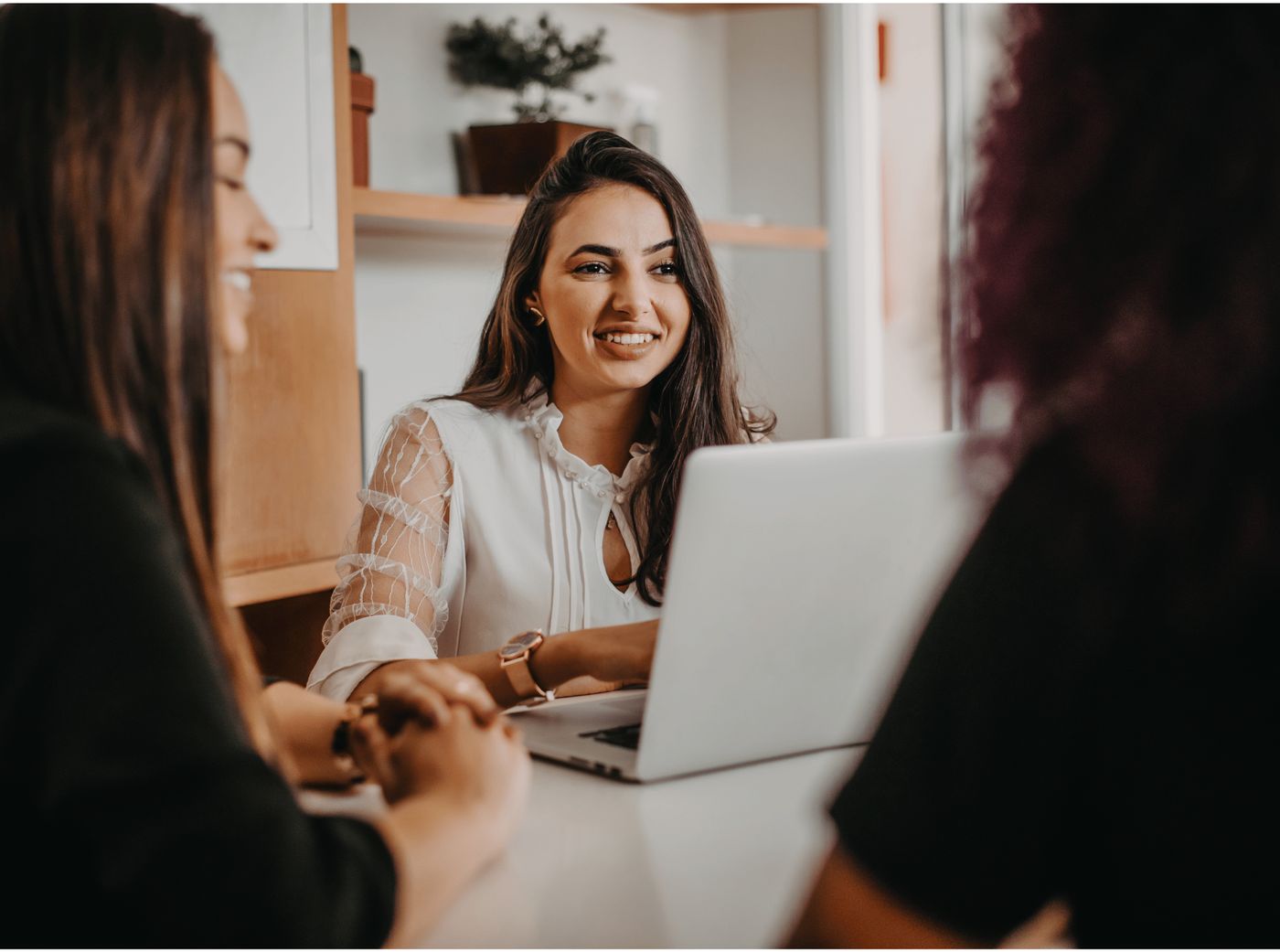A HestiaHire success manager reviewing an account with a client